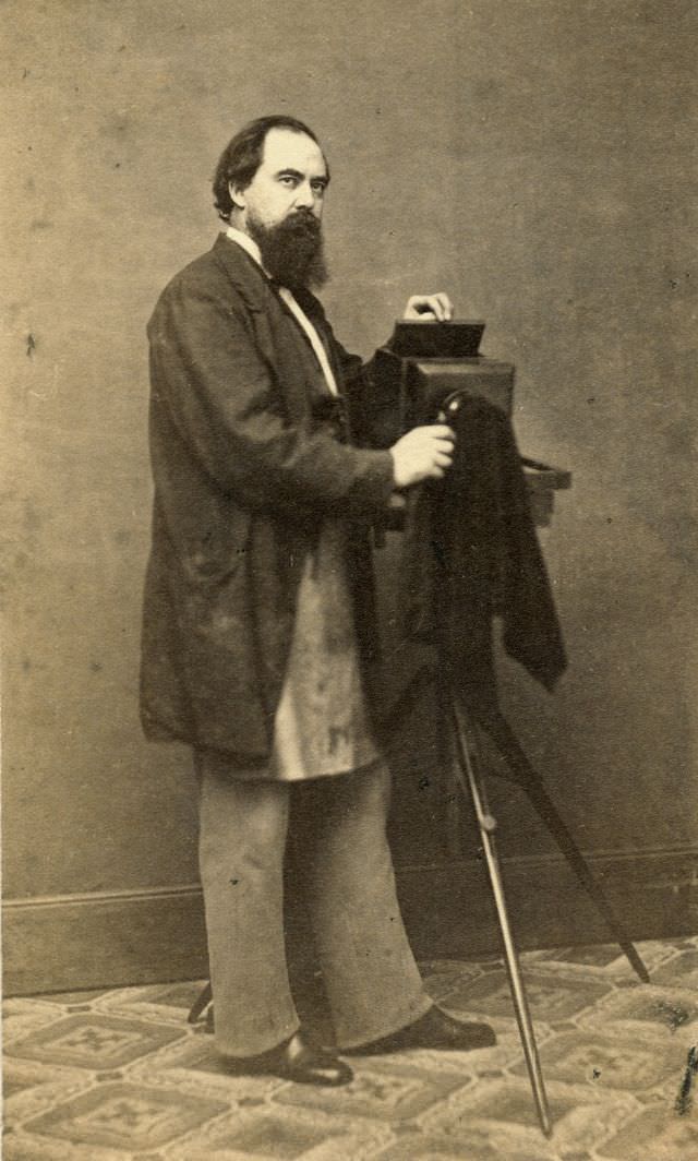 #4 A photographer with camera and soiled apron