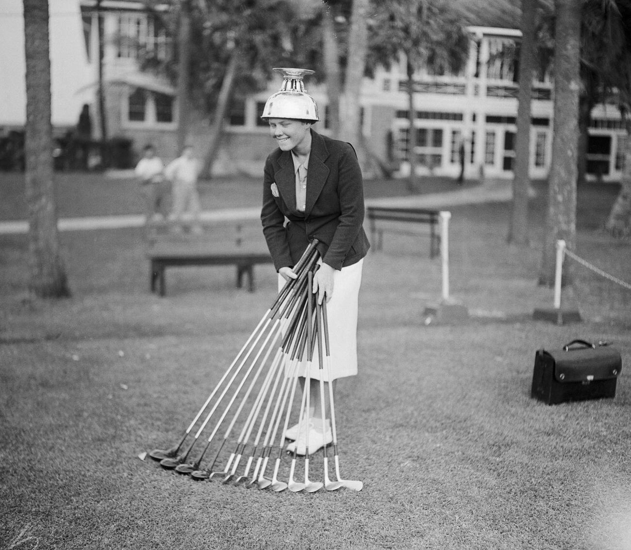 Patty Berg with championship golf clubs, Palm Beach Women’s Golf Championship.