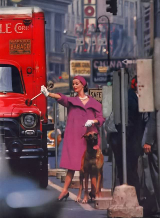 #11 Dolores Hawkins in a fluffed cyclamen wool tweed coat by Tiffeau-Busch, Vogue, July 1958.