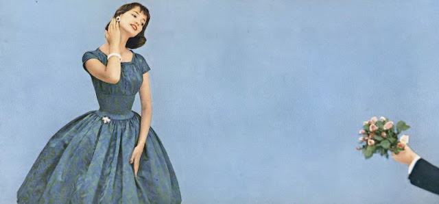 #1 Dolores Hawkins in a green and blue brocade dress by Pat Hartly, Vogue, August 15, 1955.