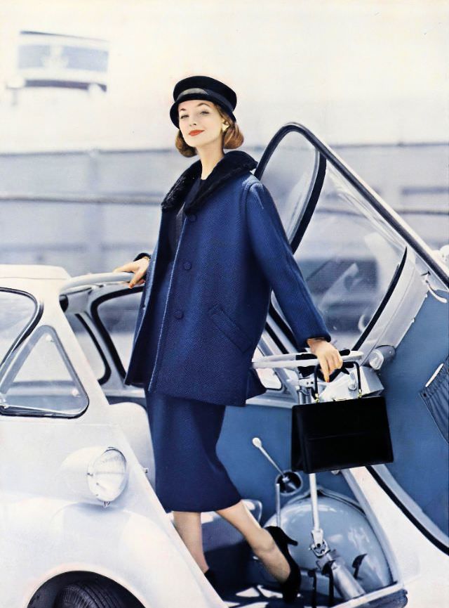 #3 Dolores Hawkins in a blue-and-black herringbone wool skirt and jacket, Vogue, August 15, 1956.