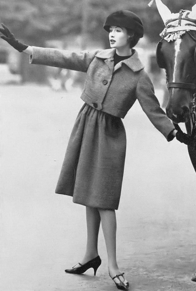 #12 Gitta Schilling in tweed skirt and jacket by Guy Laroche, October 1958.