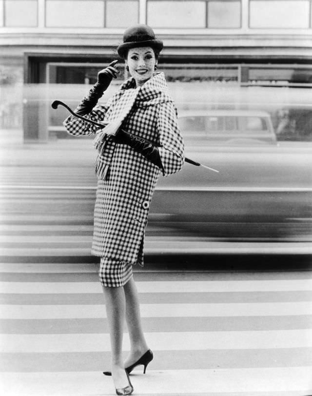 #19 Gitta Schilling in houndstooth tunic and skirt by Uli Richter, 1959.