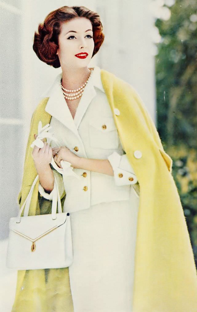 #20 Gitta Schilling in wool coat by Gunther Oppenheim, July 1959.