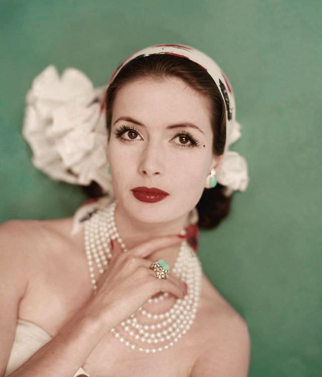 #27 Gitta Schilling with pearls by Trifari, June 1959.