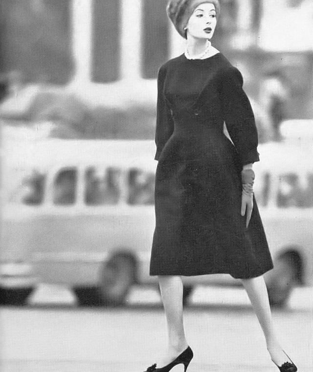 #5 Gitta Schilling in black tweed dress by Pierre Balmain, October 1958.