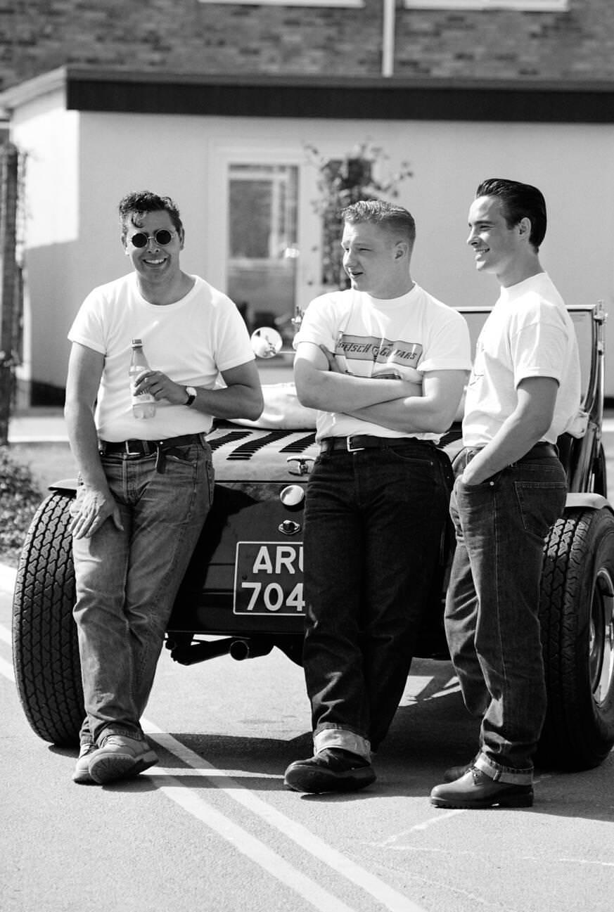 #14 “Greasers” by their 1950s street rod at Hemsby rock ‘n’ roll retro festival.
