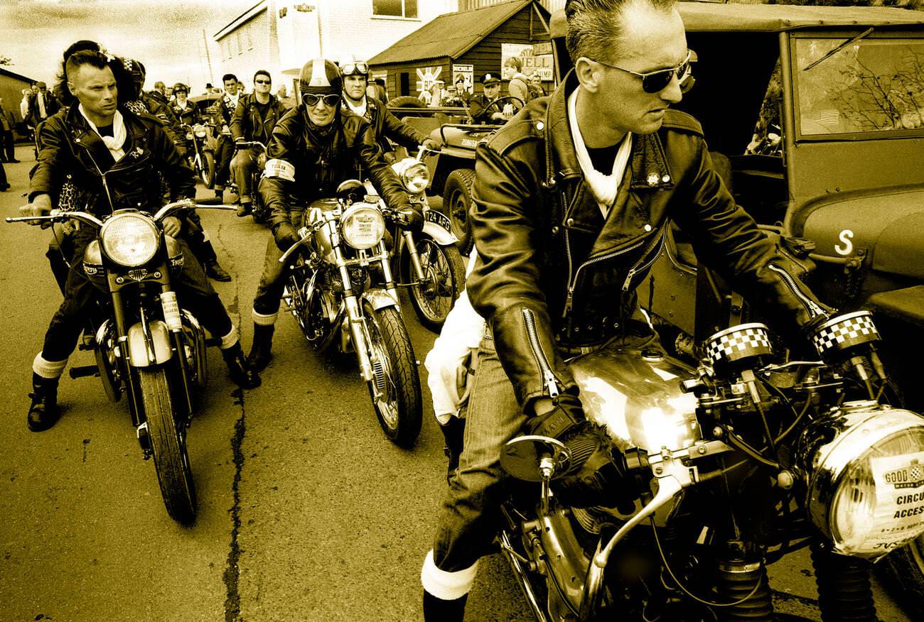 #20 Greaser 1950s rockers on British classic BSA Norton motorcycles at Goodwood Revival.