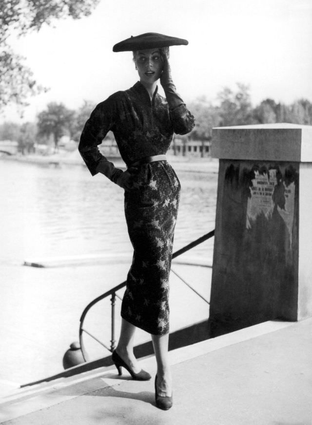 #19 Stella in a printed velvet dress for fall/winter by Madeleine de Rauch, Paris, 1953.