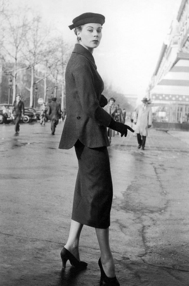 #20 Stella in an ensemble by Jacques Fath, Paris, 1953.
