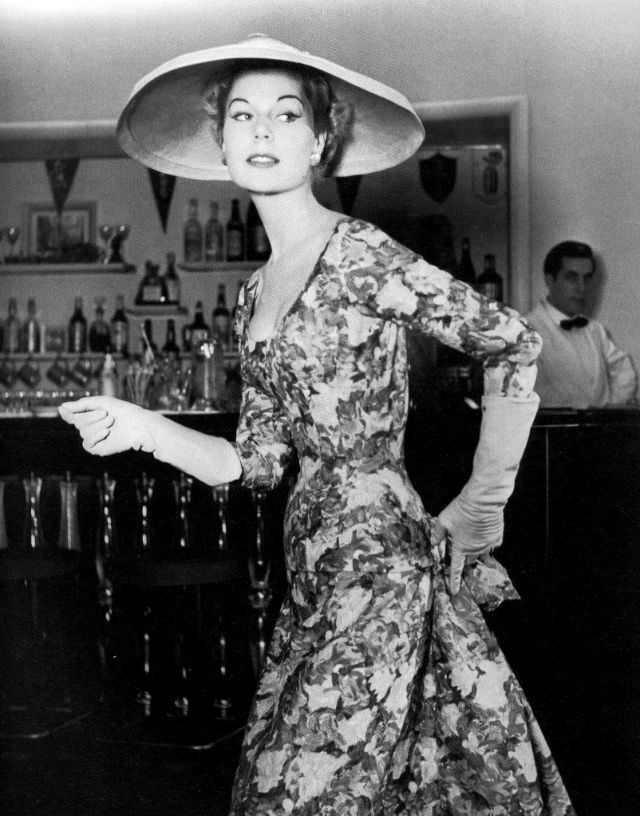 #33 Stella in a printed silk dress by Jacques Fath, 1955.
