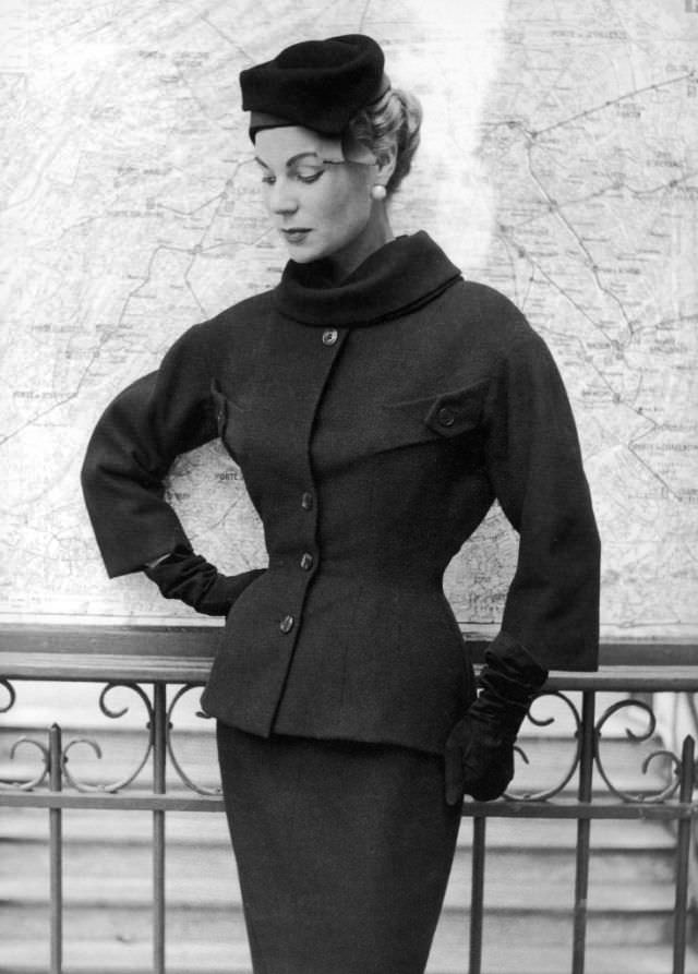 #34 Stella in a wool suit by Jacques Fath, 1955.