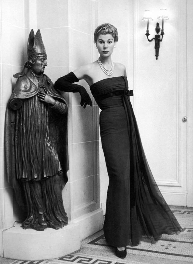 #6 Stella in a chestnut mousseline empire-style evening gown by Jacques Fath, 1953.
