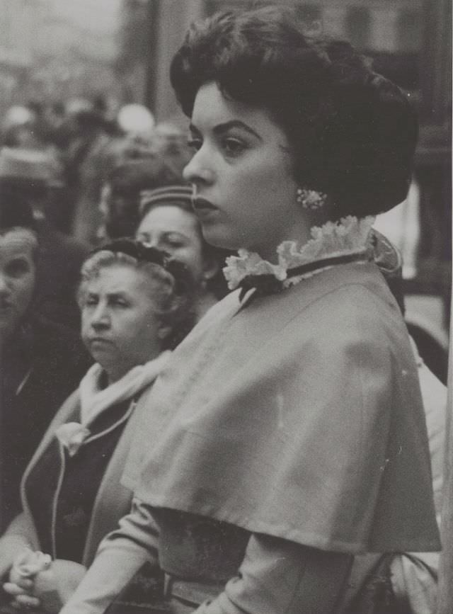 #24 Woman with shoulder covering and lace collar, 1957