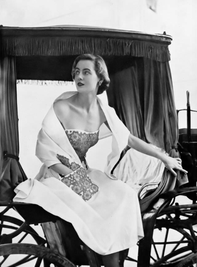 #9 Pat O’Reilly in a white piqué strapless dress by Harvey Nichols, Malta, Harper’s Bazaar UK, May 1951.
