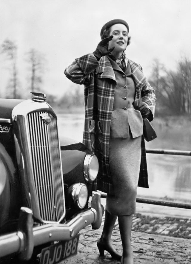 #10 Pat O’Reilly in a box coat and teal-green tweed suit by Koupy, Harper’s Bazaar UK, March 1951.