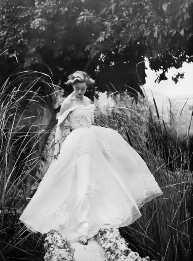 #11 Pat O’Reilly in a white net dress by Roecliff & Chapman, Malta, Harper’s Bazaar UK, May 1951.