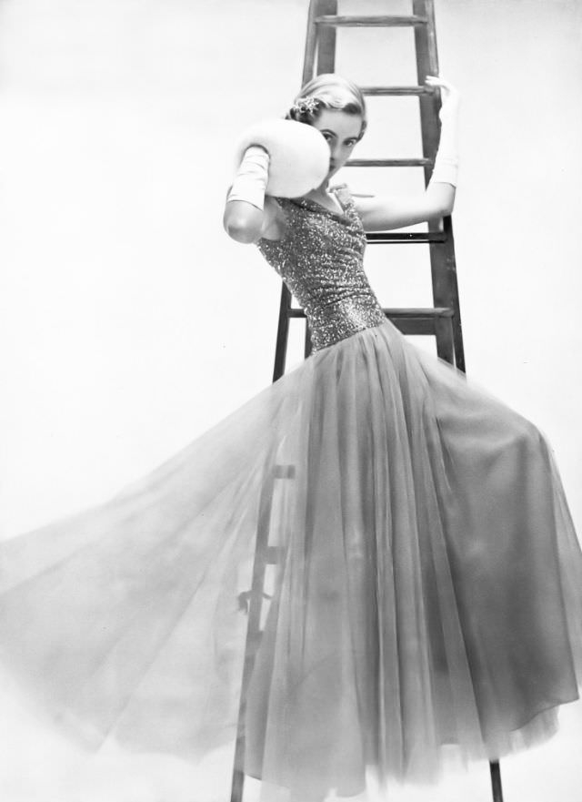 #16 Pat O’Reilly in a lavender tulle evening dress by Elizabeth Henry, Harper’s Bazaar UK, February 1951.