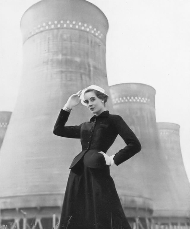 #30 Pat O’Reilly in a navy-blue rep suit by Spectator Sports, Harper’s Bazaar UK, July 1952.