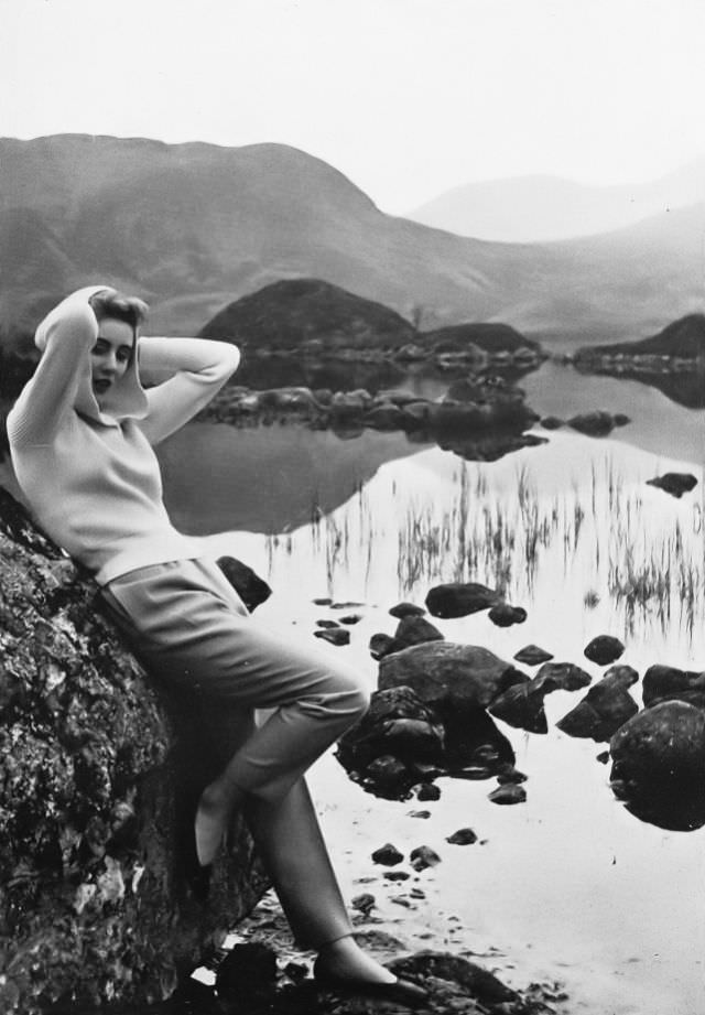 #38 Pat O’Reilly in camel-hair slacks and wool sweater by Jaeger, Scotland, Harper’s Bazaar UK, August 1953.