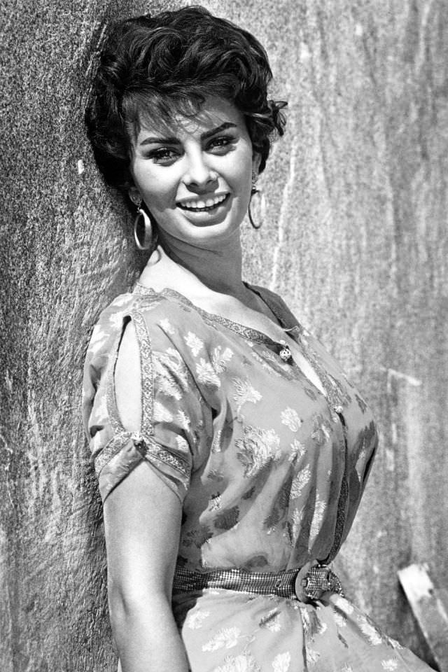 #3 Sophia Loren posing against a wall, 1950.
