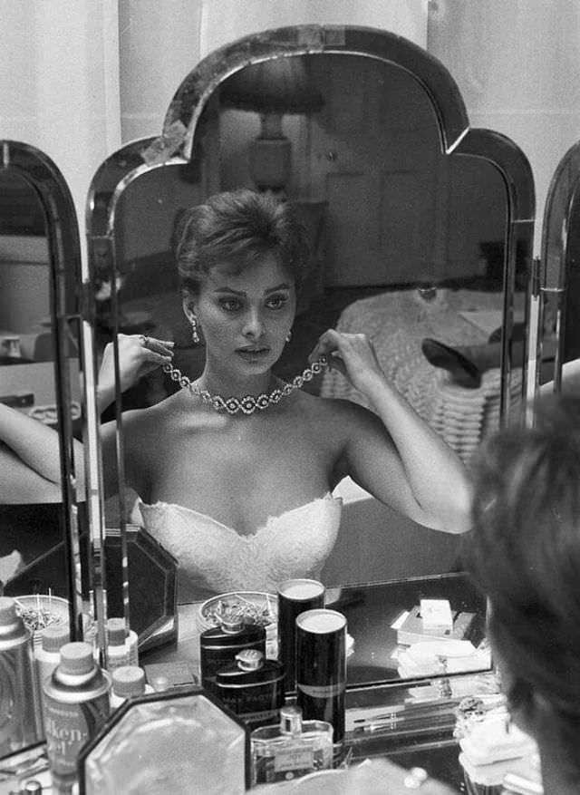 #24 Sophia Loren preparing for her meeting with Queen Elizabeth, London, November 1957.
