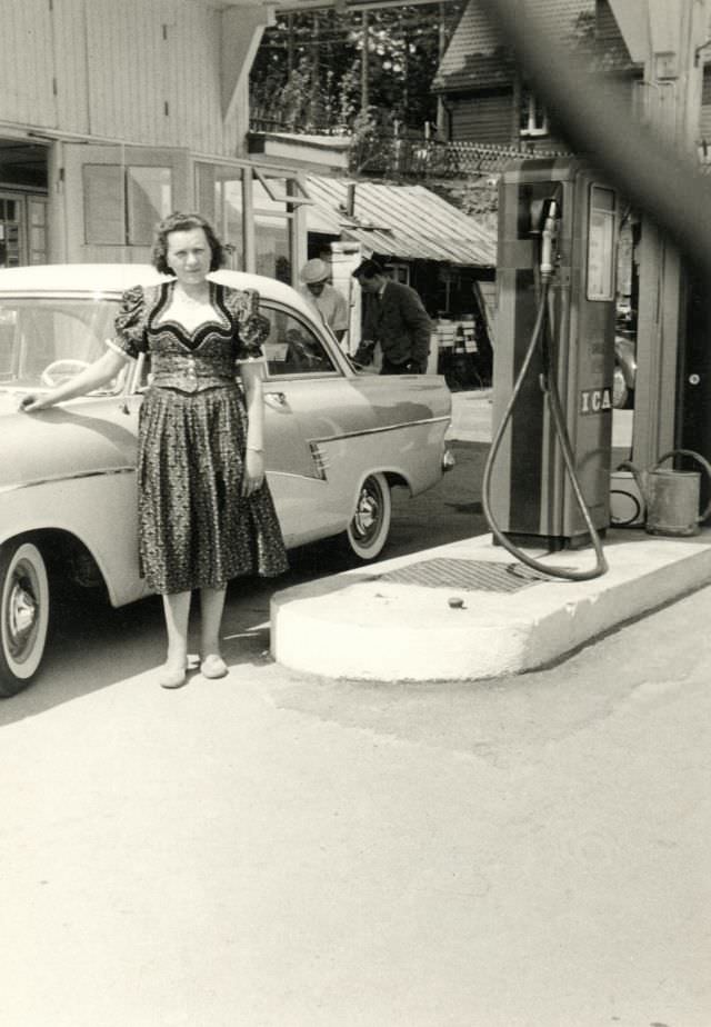 #20 Lady in a Dirndl with a Ford Taunus 17 M De Luxe, circa 1950s.