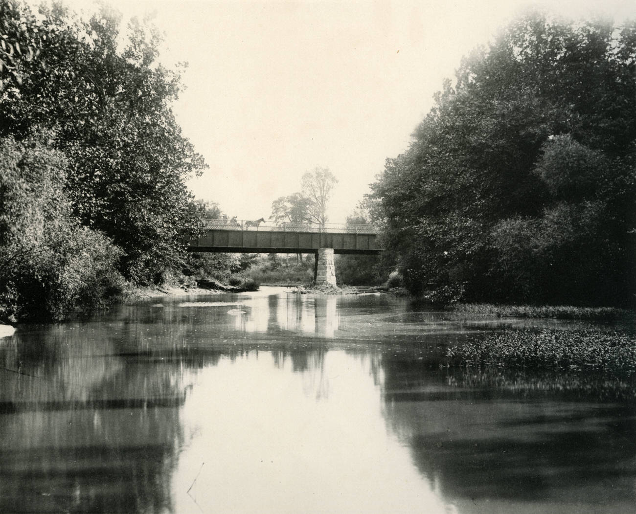 #4 A horse and carriage on Alum Creek’s Broad Street Bridge, 1897.