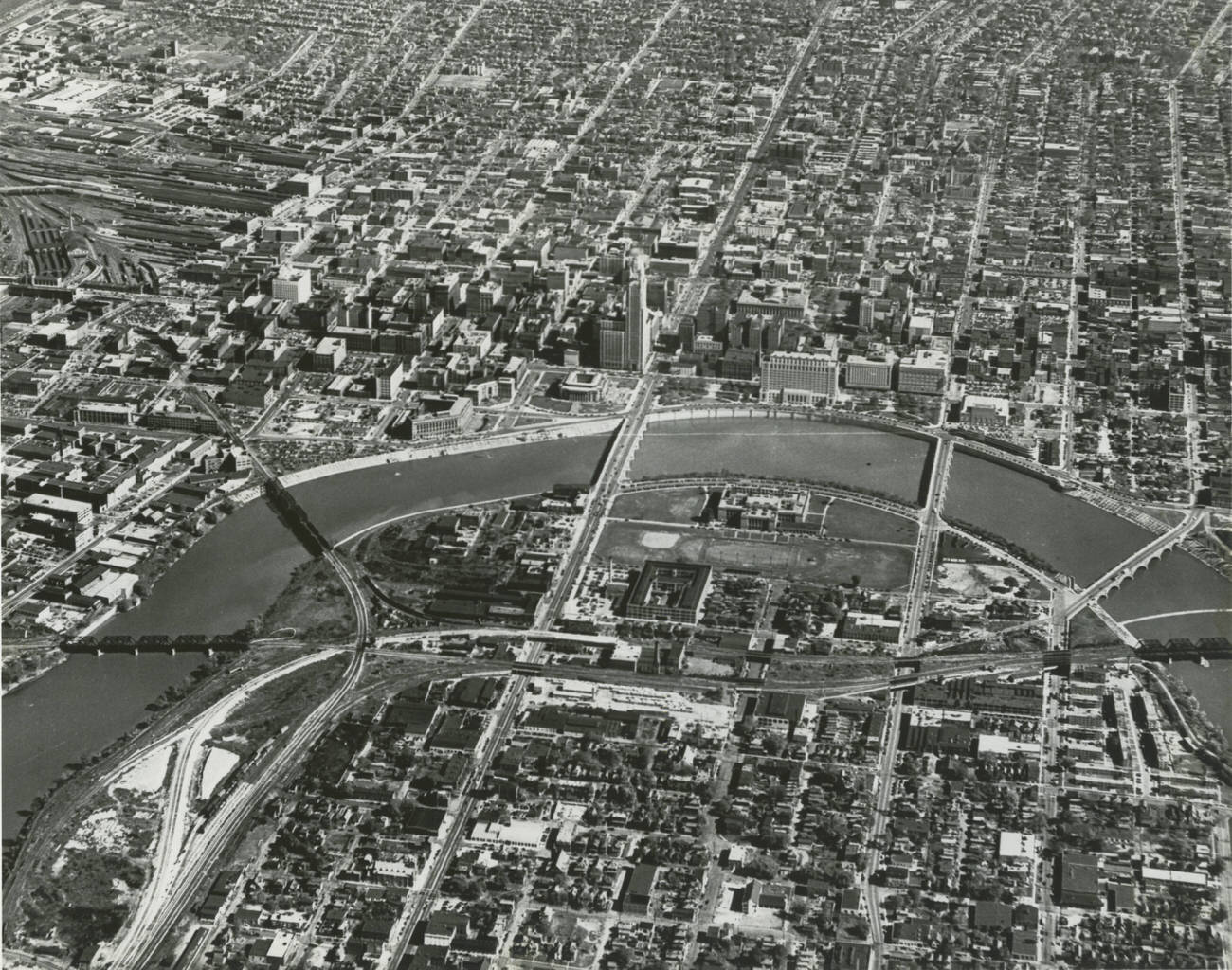 #10 Aerial view of Columbus, looking east across Franklinton, the Scioto River, and downtown, circa 1950.