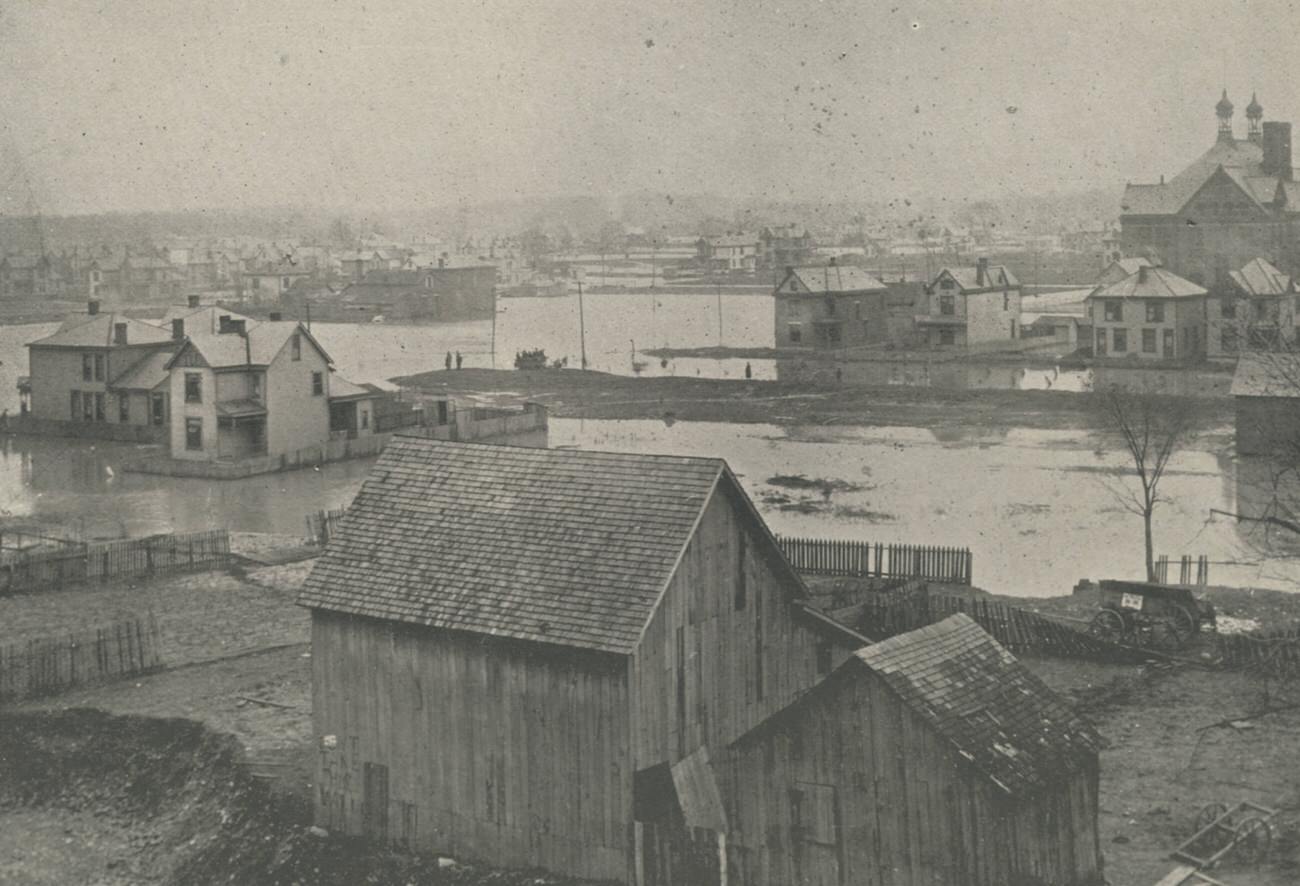 #6 Aerial view of 1898 flood in Columbus, looking west from Mt. Carmel Hospital, March 1898.