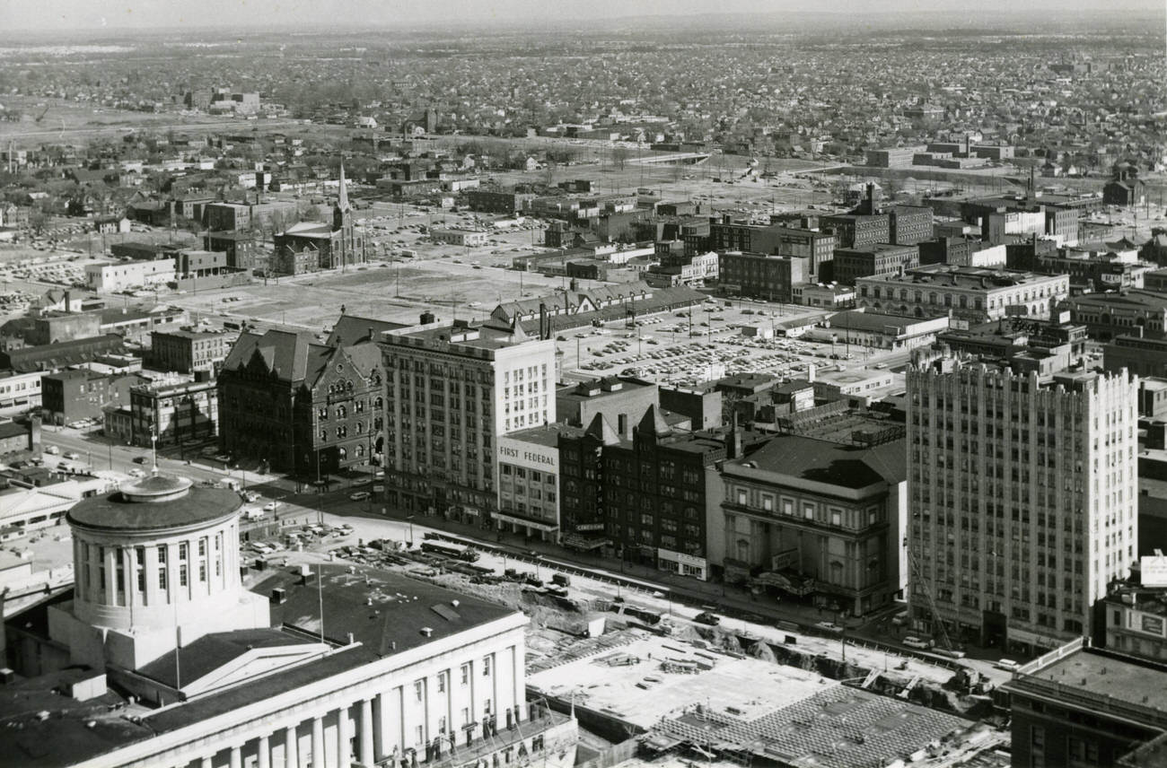 #6 Aerial view of Capital Square, featuring construction of the underground parking garage, 1964.