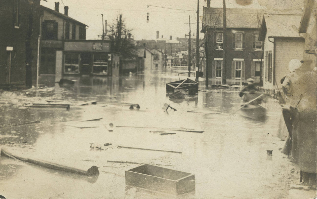 #4 Scene of the 1913 flood in Columbus, showing floating debris, possibly at 516 W. State St., 1913.