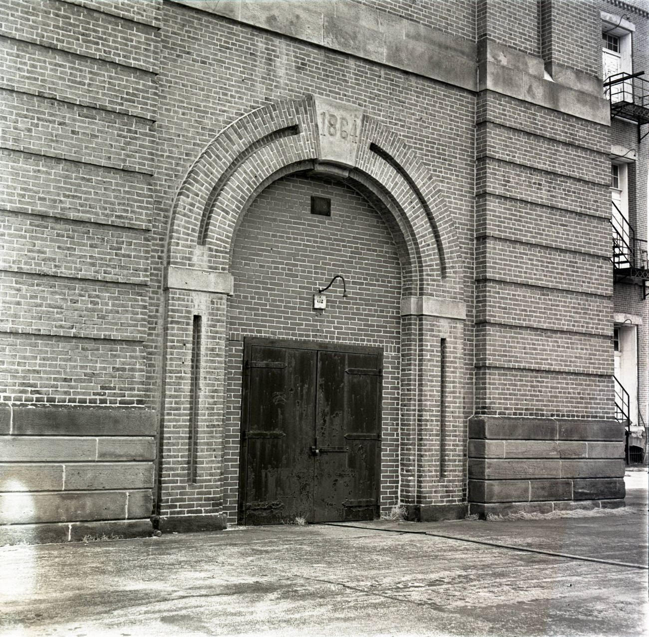 #13 Barracks or Shot Tower at Fort Hayes, originally the Arsenal, built in 1863-1864, now part of Columbus Public Schools, 1974.