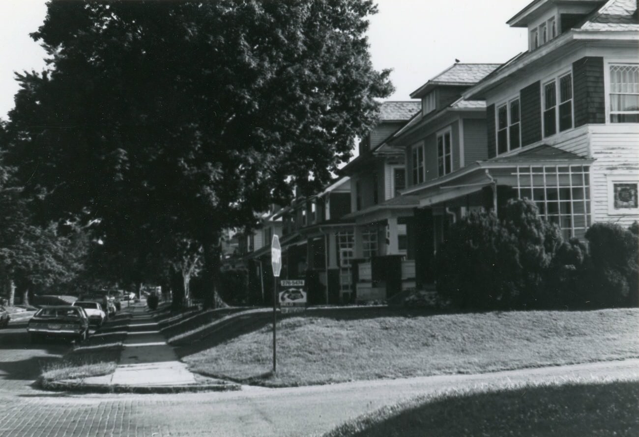 #1 Photo of the corner of Grace St. and Eldon Ave, with 116 Eldon Ave., for the Greater Hilltop Area Commission’s guide, 1980s