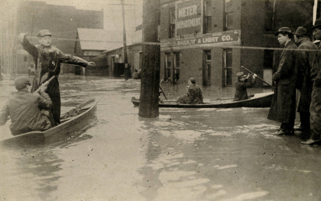 #42 Broad and Levee Streets during the 1913 flood, showing people and rescue boats, March 26, 1913.