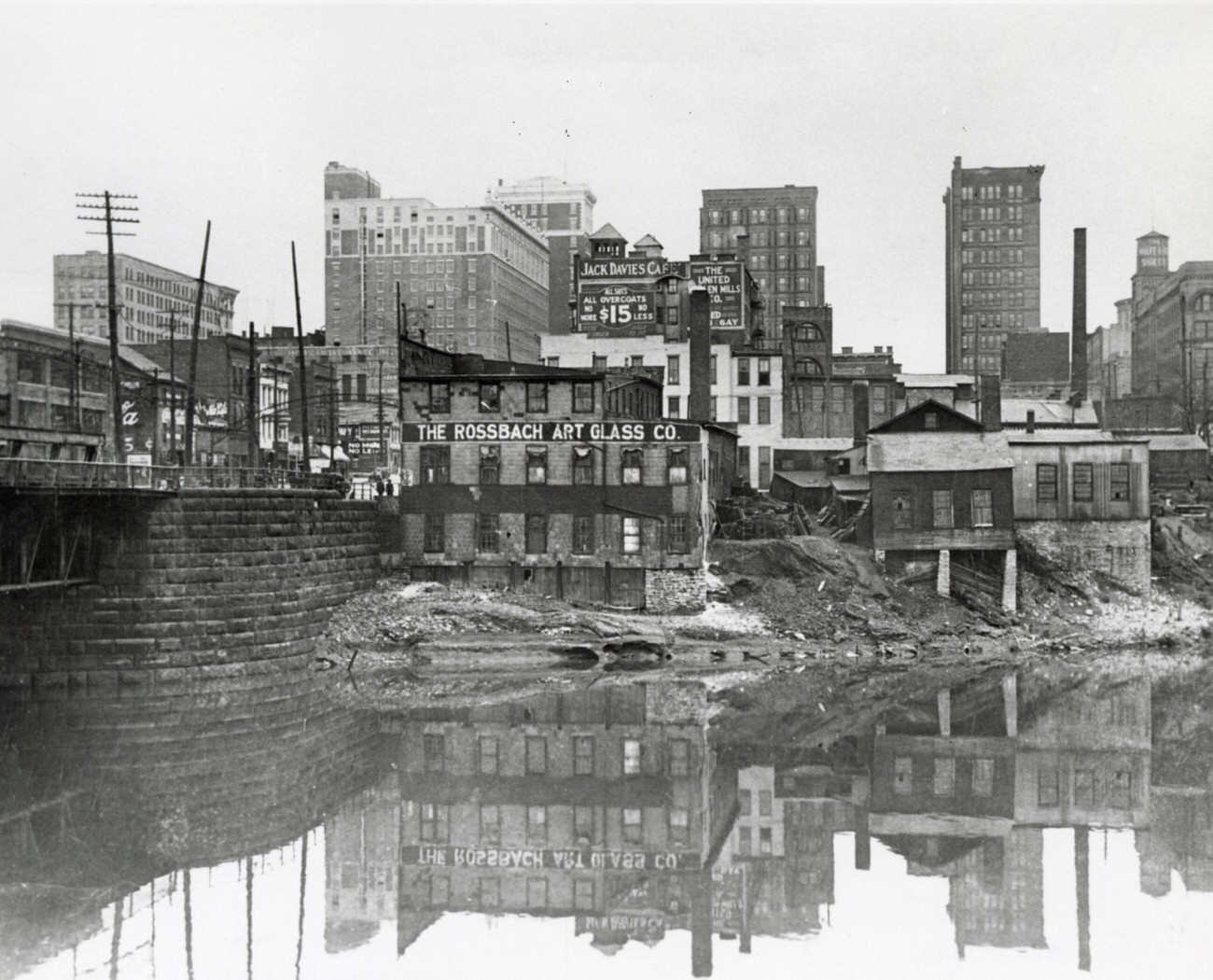 #61 Downtown Columbus slum area on east bank of the Scioto River, view of Broad Street Bridge, 1916.