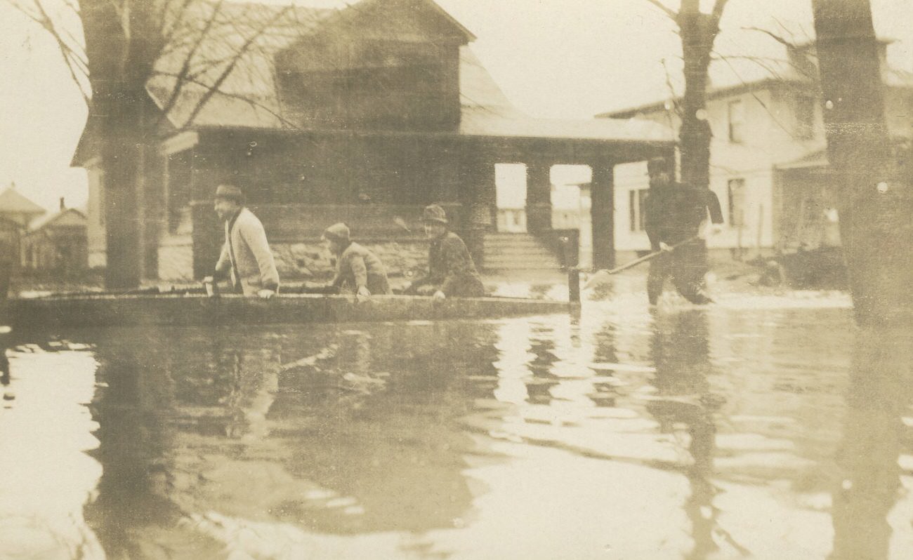 #72 Flooded street scene with house and boat, Columbus, 1913.