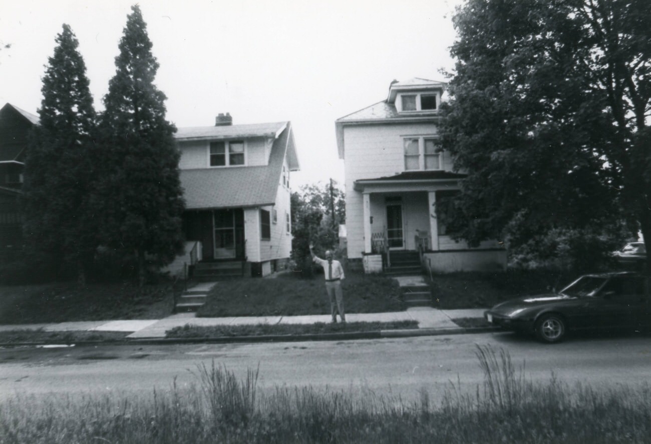 #37 249 and 253 S. Burgess Ave., with an unidentified man waving, featured in the Greater Hilltop Area Commission’s guide, 1980s.