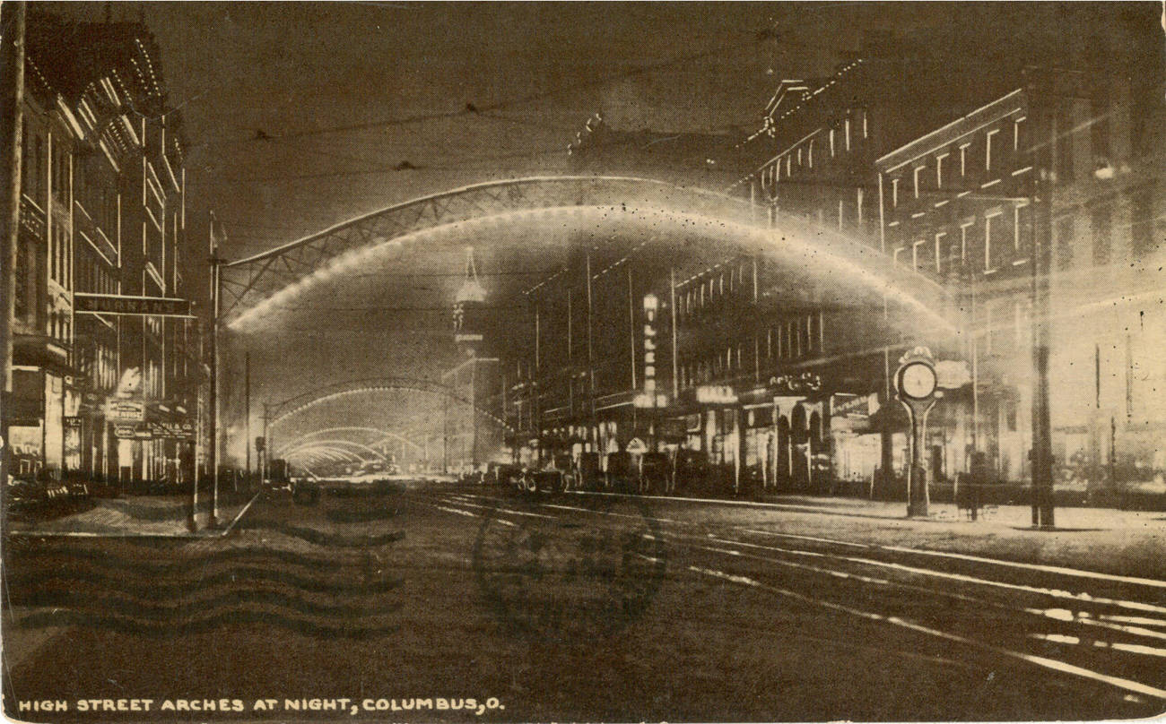 #90 Night view of High Street Arches at South High St, Columbus, 1910s