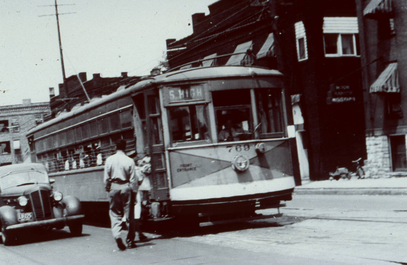 #26 Streetcar No. 769 boarding passengers on High St. near 11th Ave., 1947.