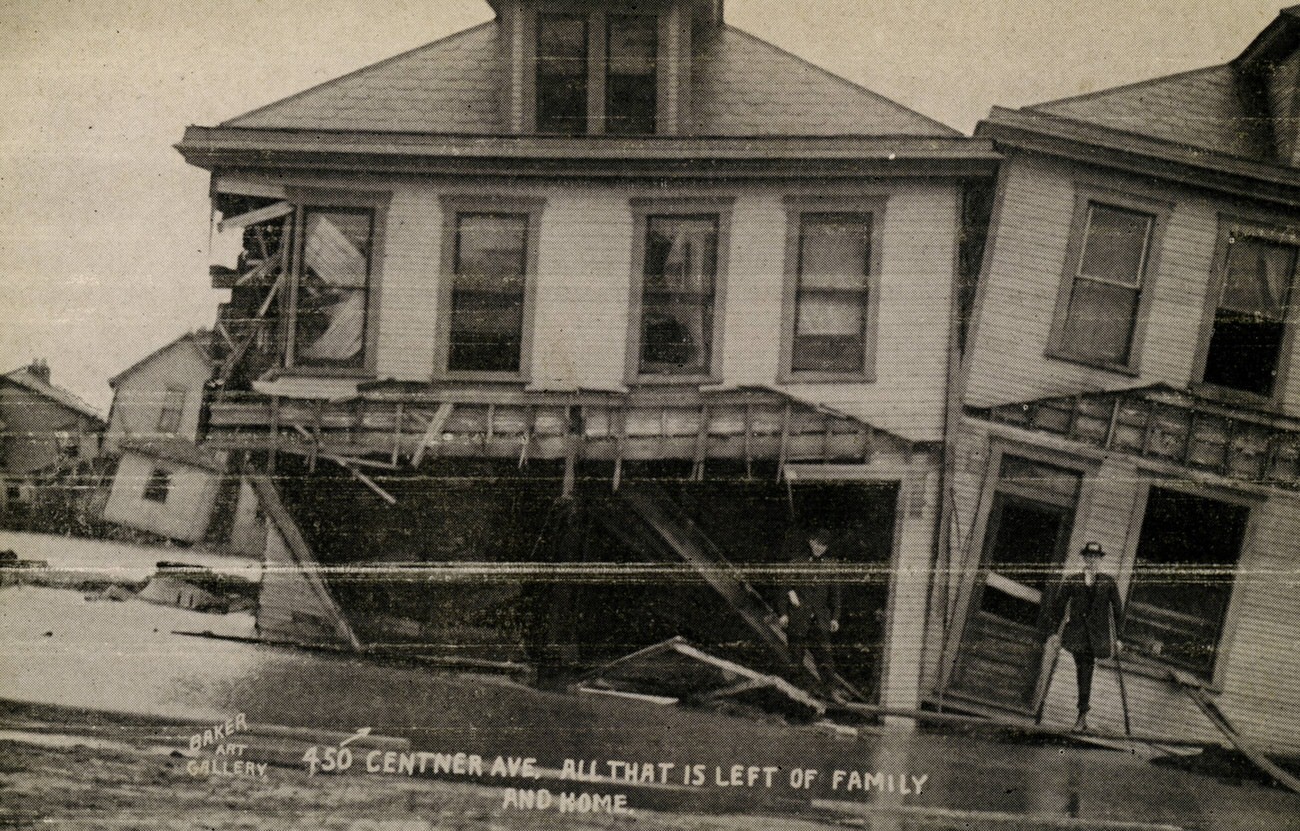 #17 Man in front of destroyed homes on Centner Avenue, showcasing flood’s destructive force, 1913.