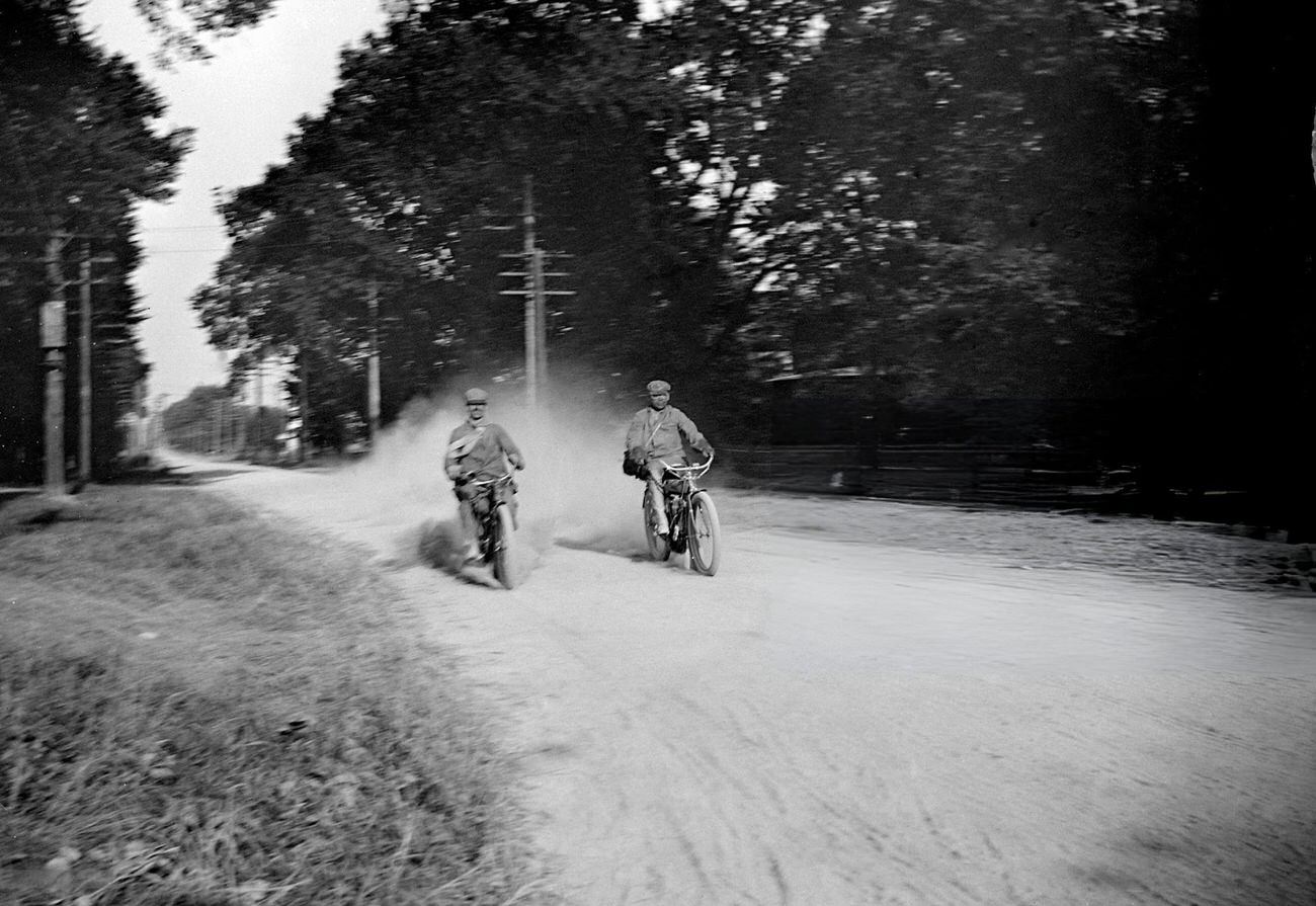 #108 Two motorcyclists on a dirt road, Columbus, Ohio, circa 1910