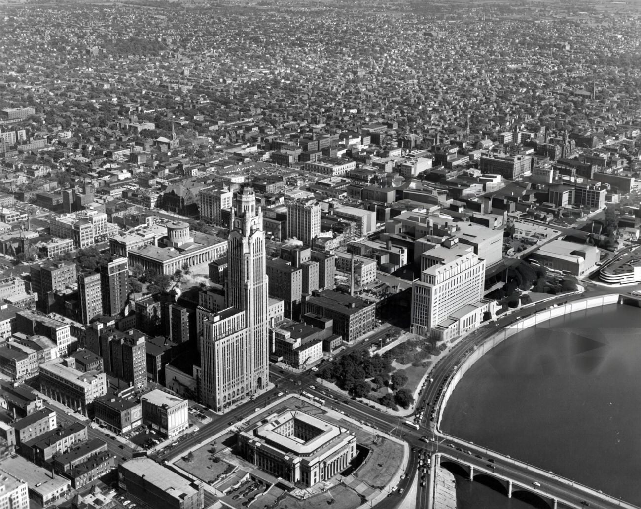 #59 Aerial view of downtown Columbus, Ohio, looking southeast with City Hall, LeVeque-Lincoln Tower, and Departments of State Building in the foreground, 1955