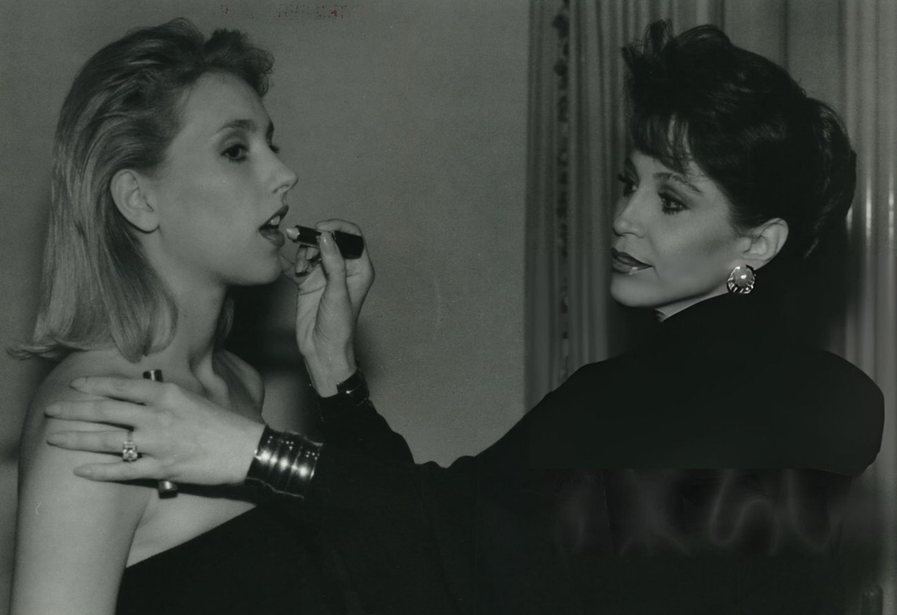 #109 Adriana Banks applies makeup to models, Houston, Texas.