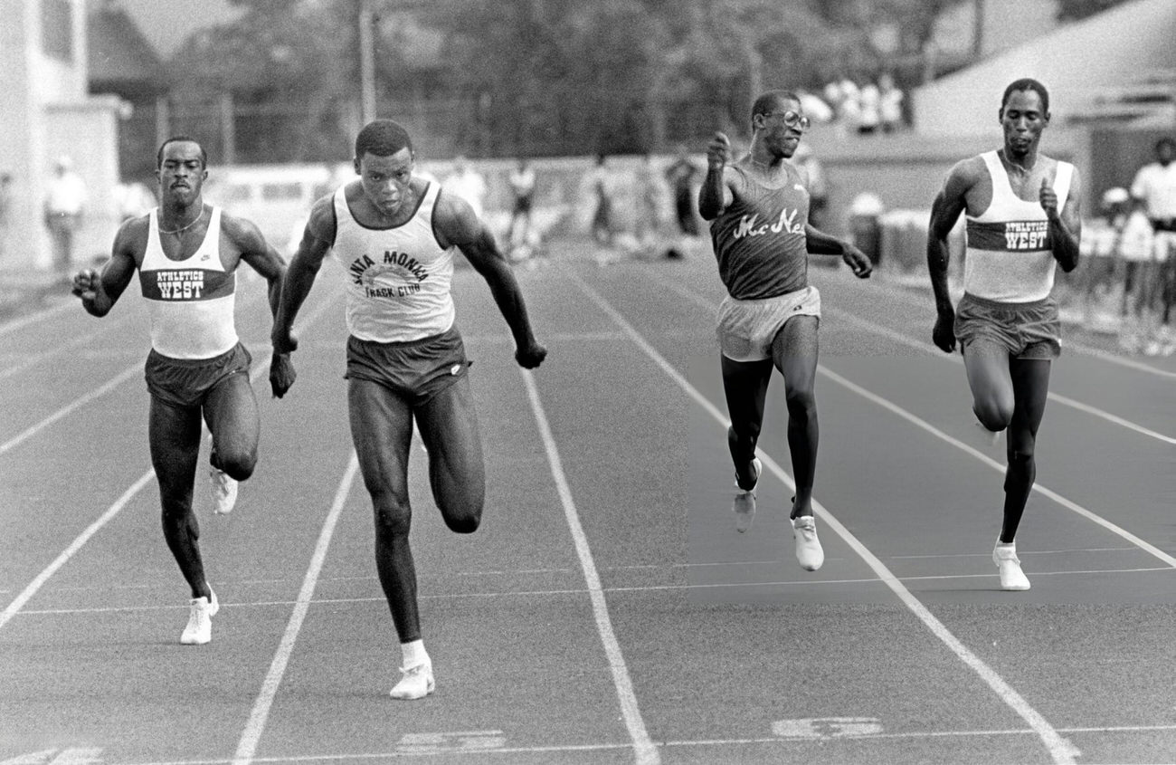 #1 Competitors in the 100-meter run at the University of Houston Invitational track meet, Houston, Texas, 1983.