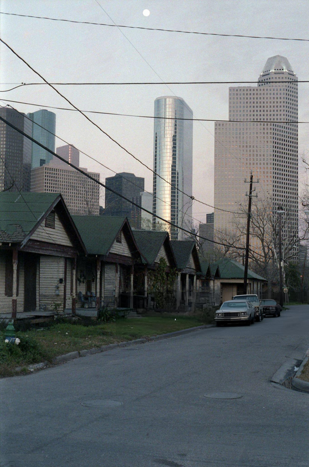 #21 Moonrise over downtown Houston from the Fourth Ward, Houston, Texas, February 11, 1987.