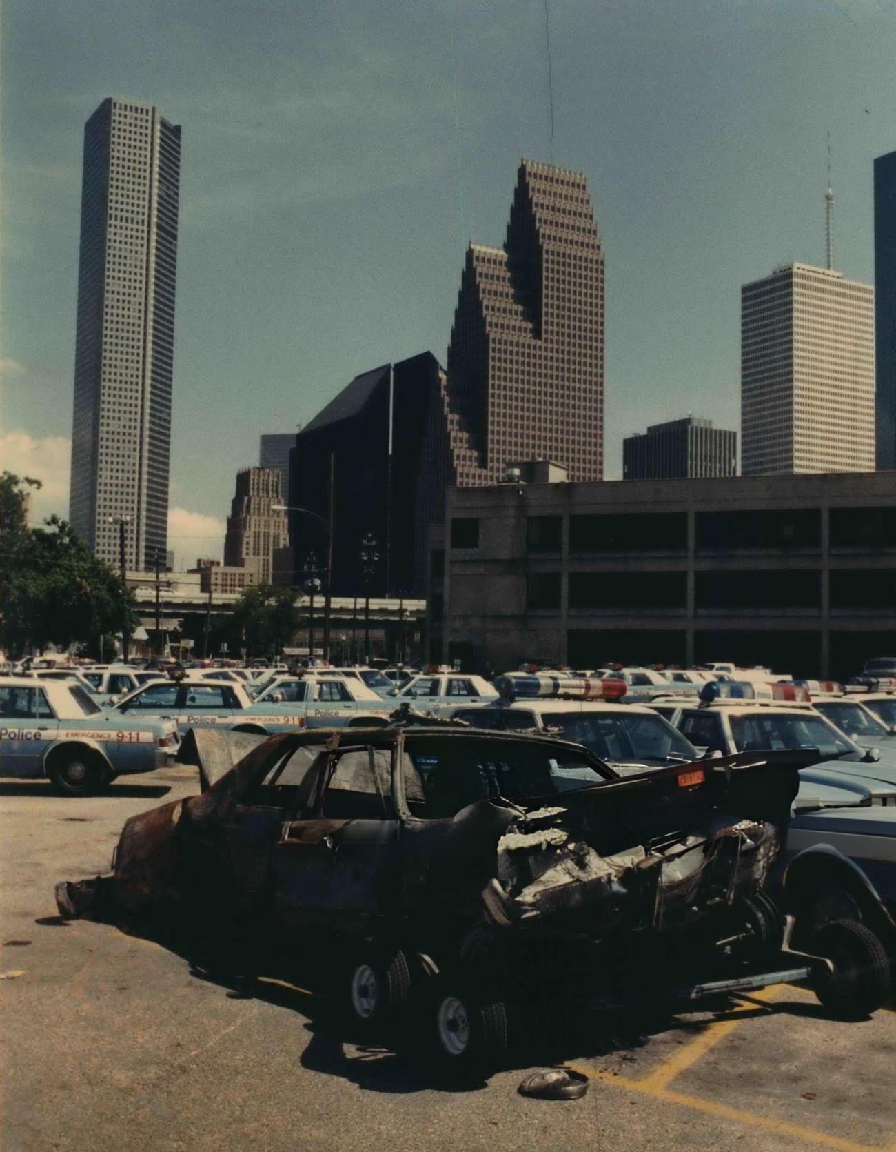 #24 A Houston police patrol car bursts into flames after colliding with another patrol car during a high-speed chase, Houston, Texas.