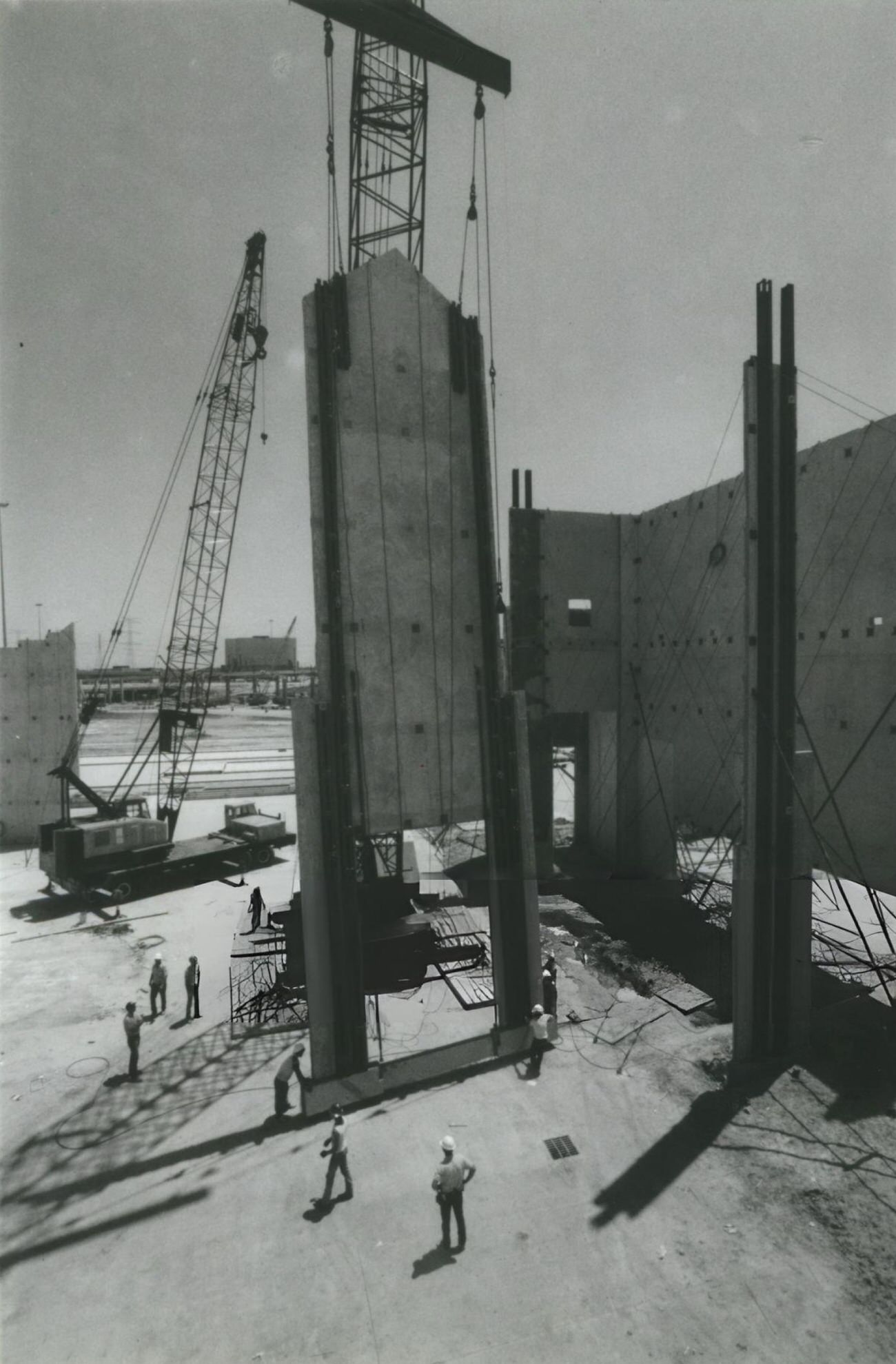 #26 A crane lifts a wall panel for the Commons at Greenspoint shopping center, under construction at Interstate 45 North and Beltway 8, Houston, Texas.