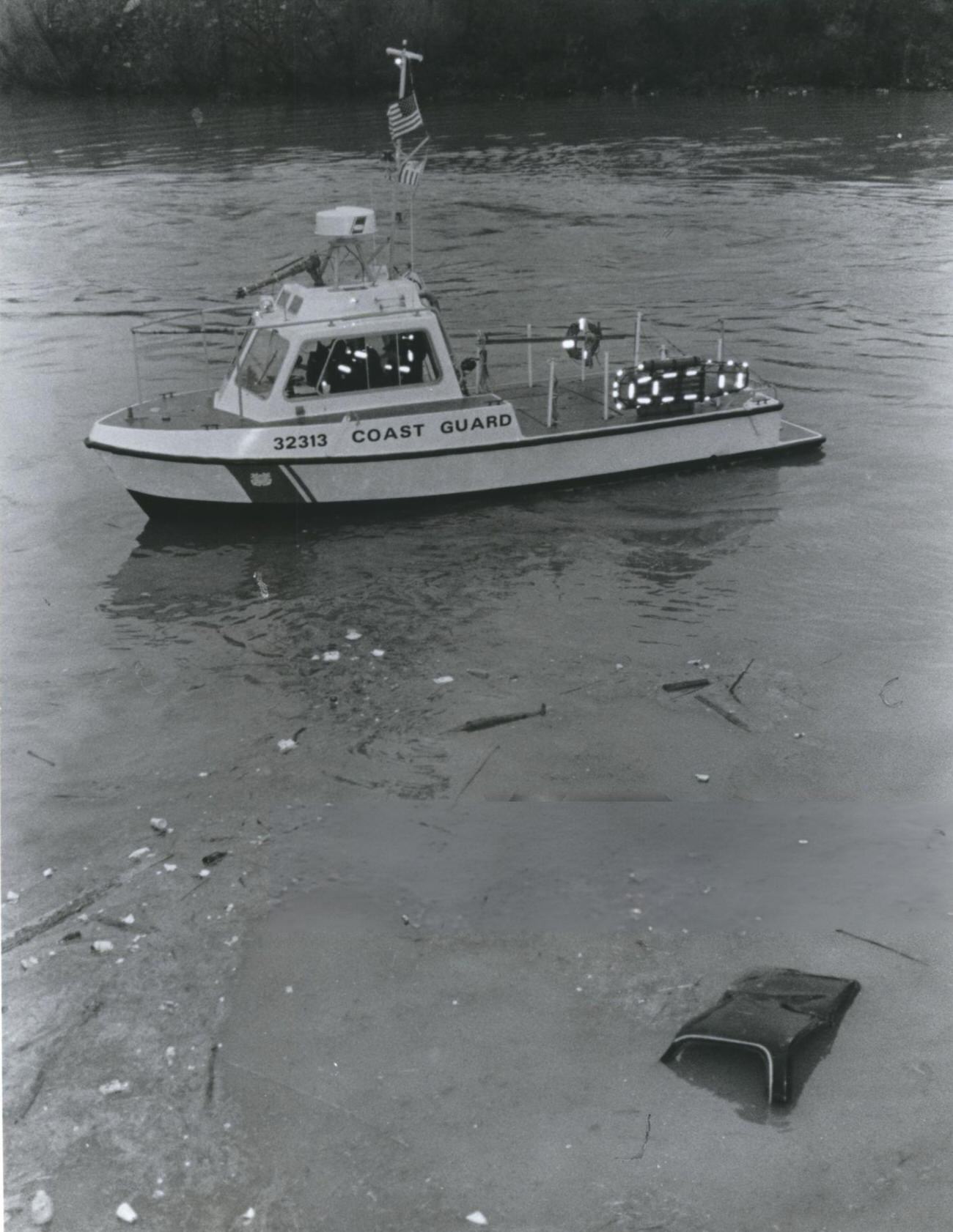 #44 A Coast Guard boat near a surfaced stolen car in Buffalo Bayou highlights the unexpected discoveries in urban waterways, Houston, Texas.