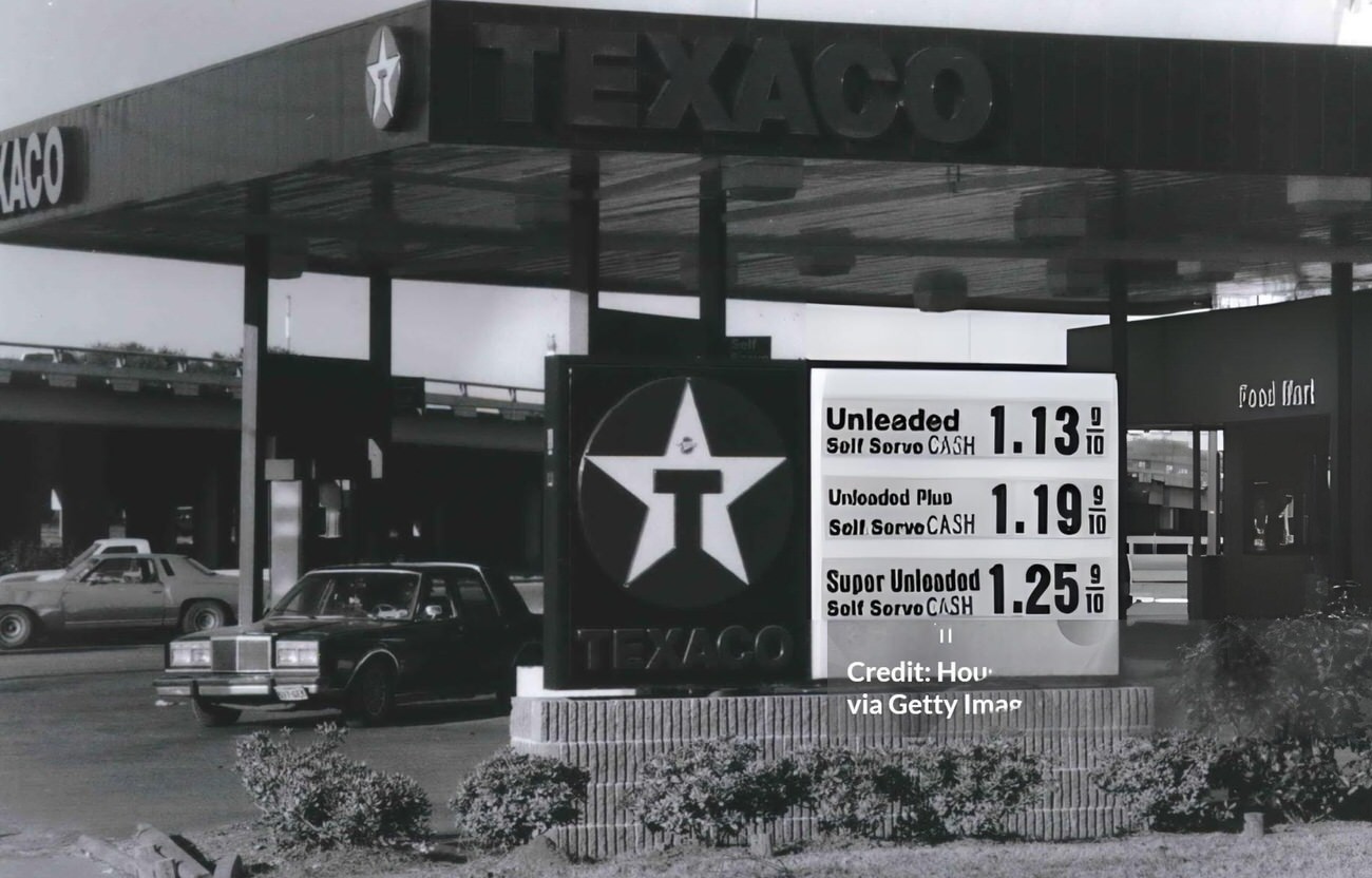 #14 Gasoline prices show variability at three stations at Loop 610 South and Broadway, reflecting economic differences, Houston, Texas, 1991.